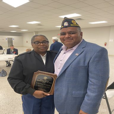 Jimmie with Major Cynthia Bunch on being recognized as the NC Instructor of the Year by the American Legion.