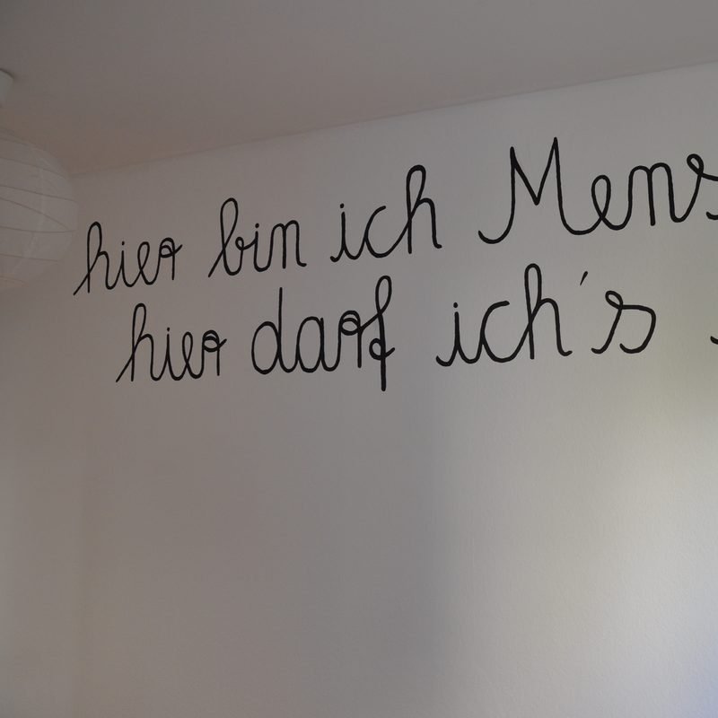 Zitat an der Wand