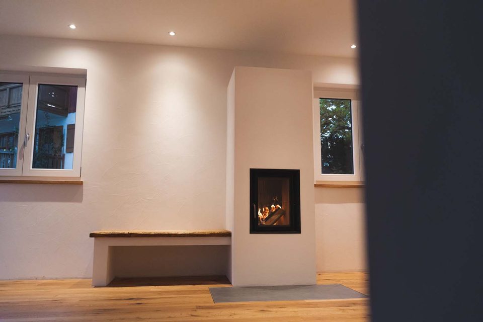 Ofen mitten im Wohnzimmer als zentrale Heizung